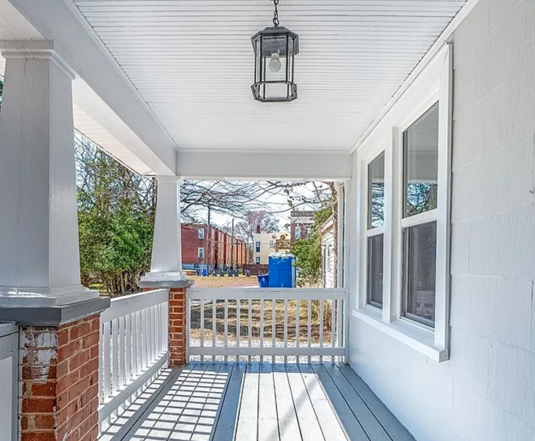 Sunny porch view of a successful Borrower rehab project funded by Marie William Capital.